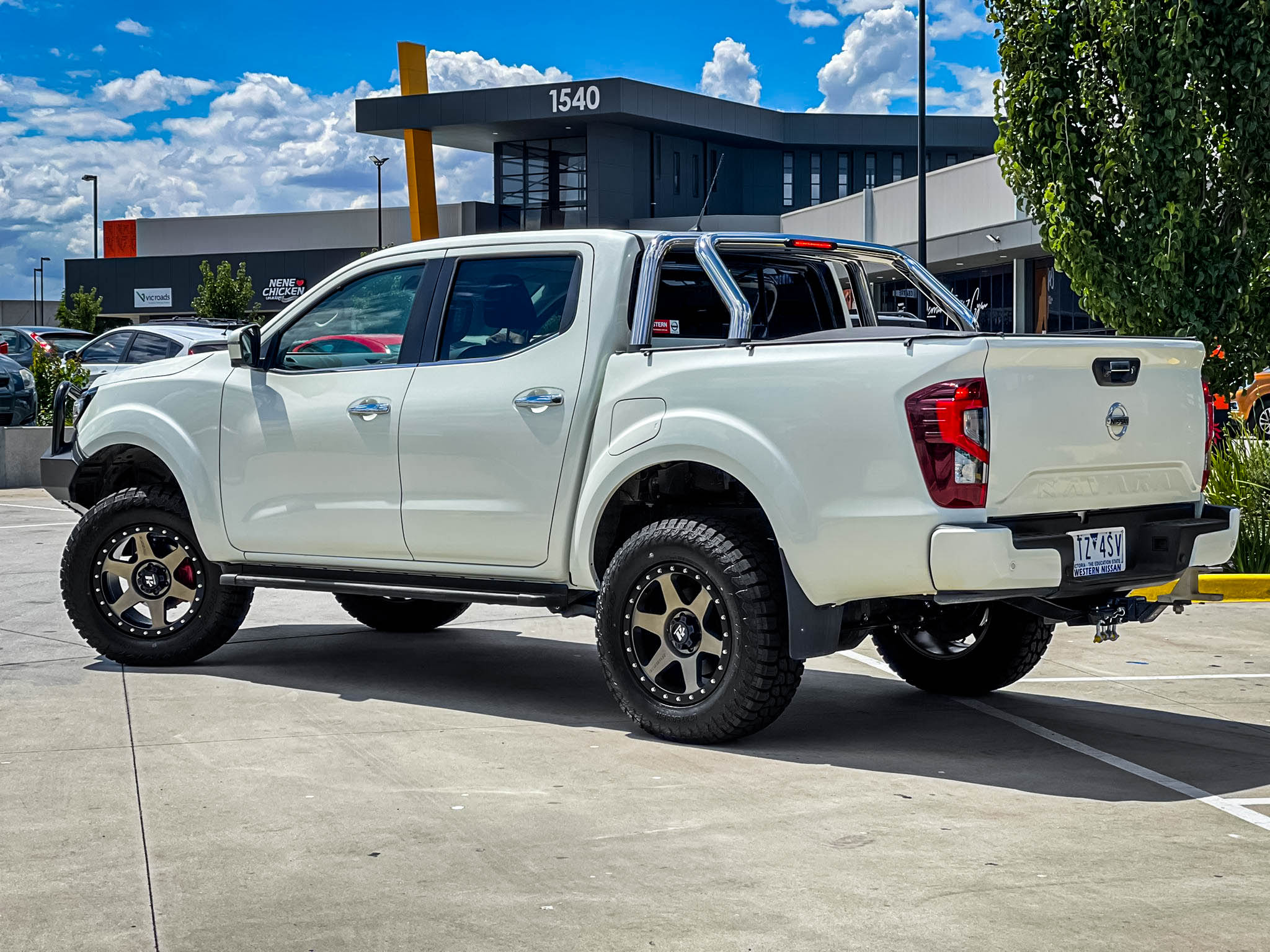 NISSAN_NAVARA_HUSSLA_SPITFIRE_MATTE_BRONZE_BLACK_LIP_CHROME_BOLTS_18_MONSTA_HYBRID_RT1.jpg