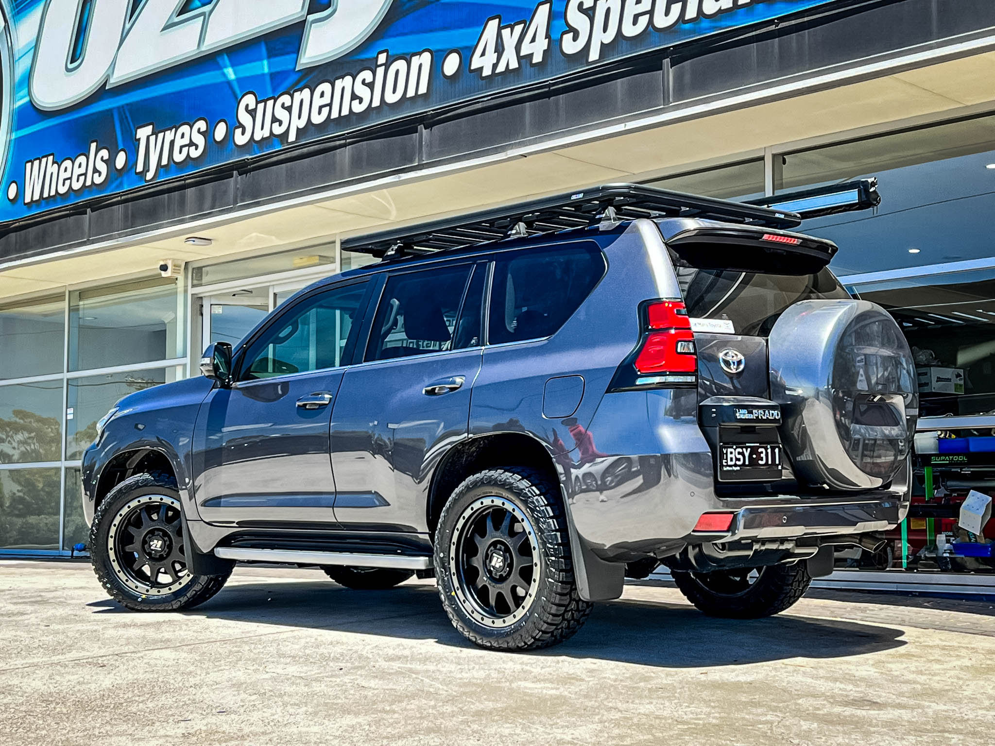 TOYOTA_LAND_CRUISER_PRADO_HUSSLA_RAPTOR_MATTE_BLACK_DARK_TINT_LIP_BLACK_BOLTS3.jpg