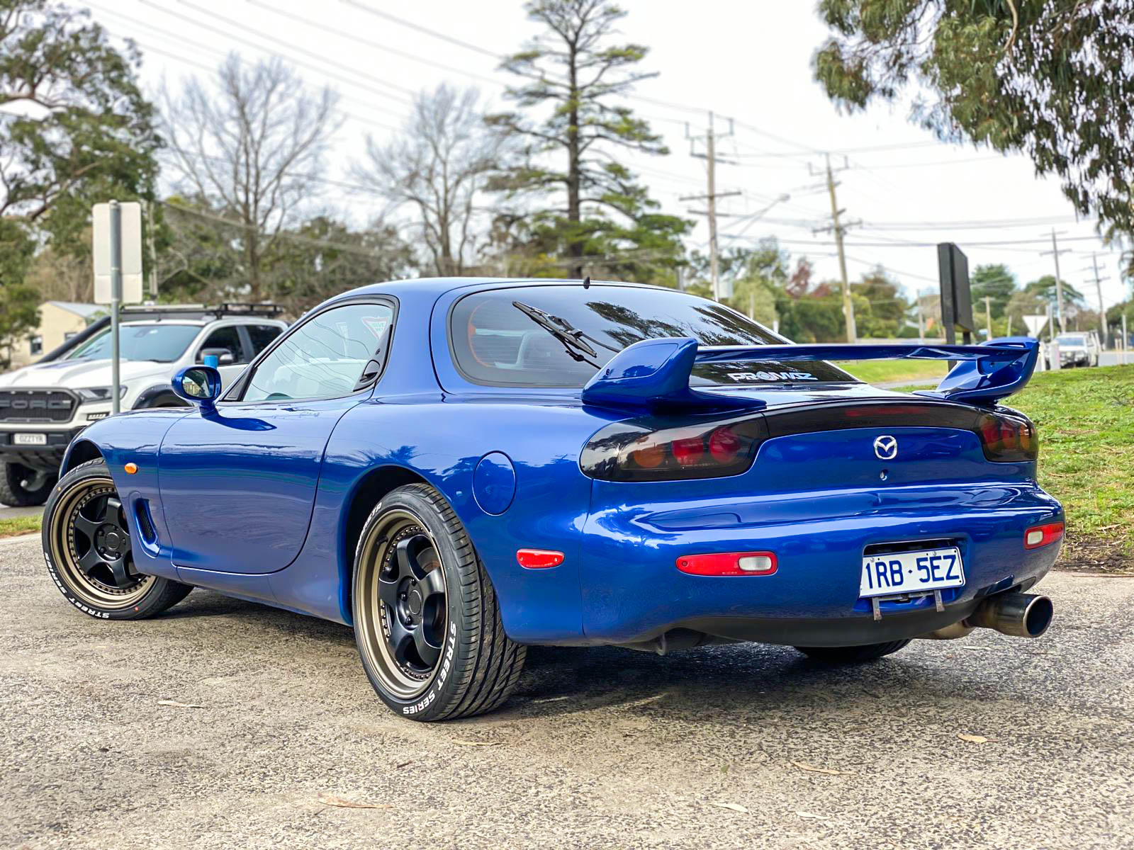 MAZDA_RX-7_HUSSLA_ZEN_MATTE_BLACK_GLOSS_BLACK_RIVETS_BRONZE_LIP_MONSTA_STREET_BLACK4.jpg