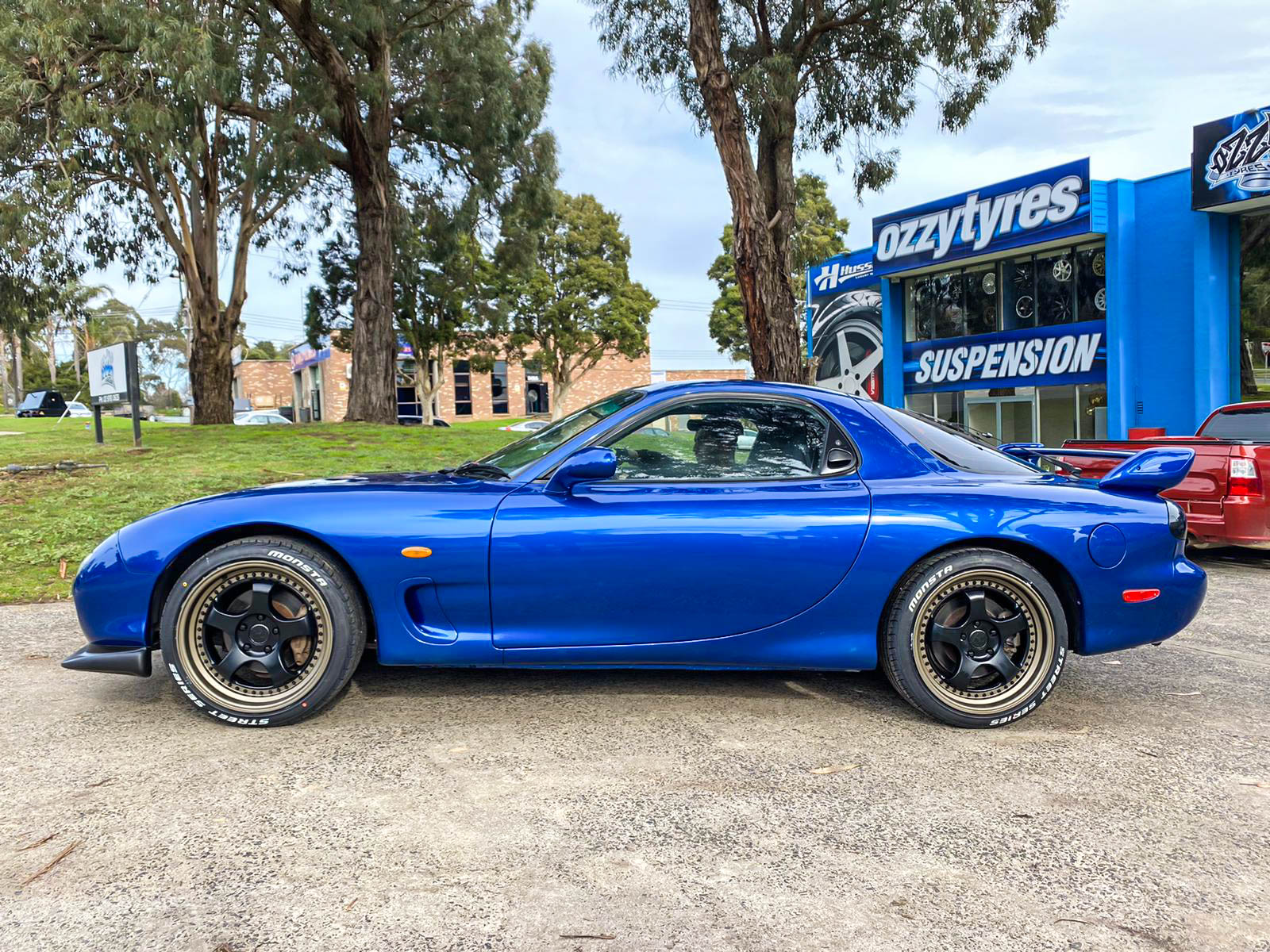 MAZDA_RX-7_HUSSLA_ZEN_MATTE_BLACK_GLOSS_BLACK_RIVETS_BRONZE_LIP_MONSTA_STREET_BLACK5.jpg