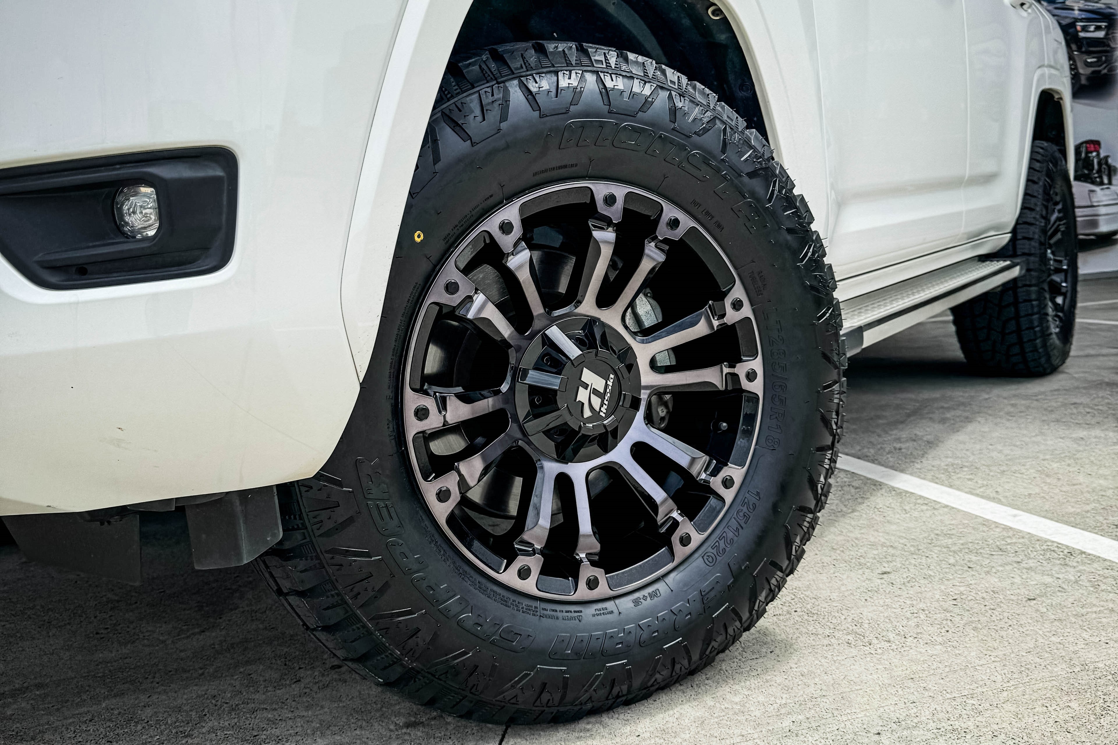 TOYOTA_LAND_CRUISER_300_SERIES_HUSSLA_AMBUSH_GLOSS_BLACK_DARK_TINT_FACE_3.jpg