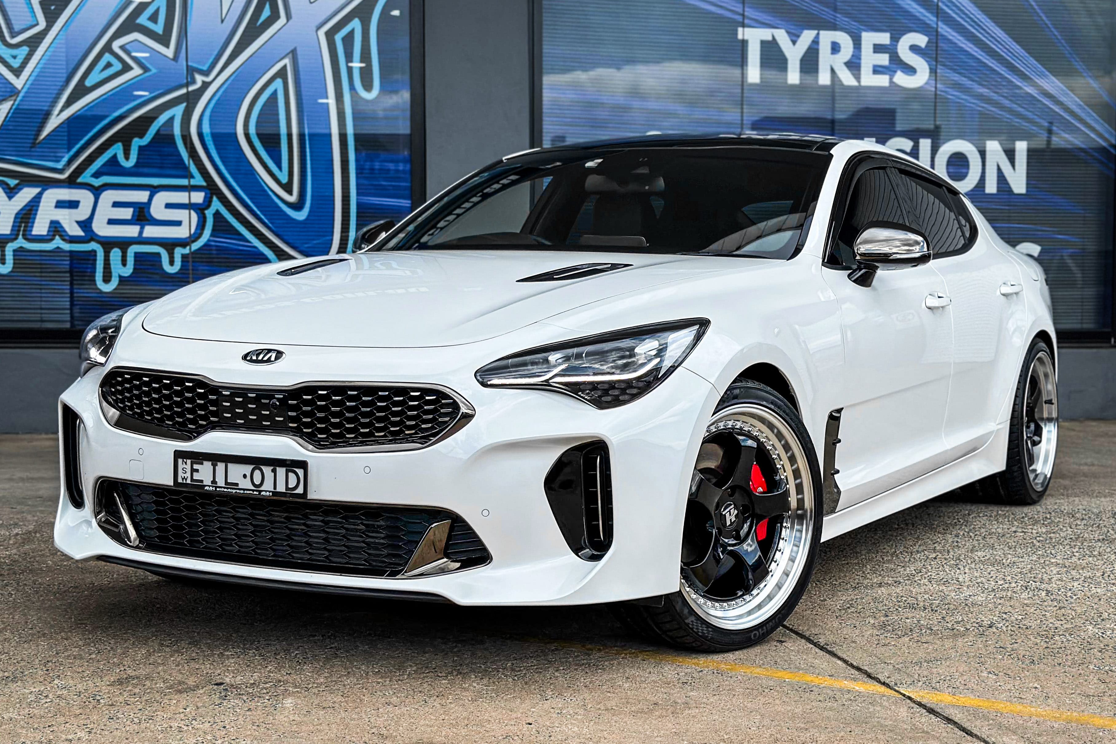 KIA_STINGER_HUSSLA_ZEN_GLOSS_BLACK_CHROME_RIVETS_MACHINED_LIP_1_2_3.jpg
