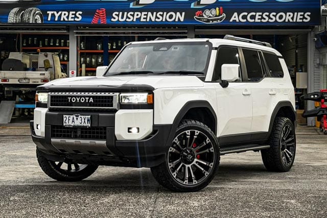 TOYOTA_LAND_CRUISER_PRADO_HUSSLA_AMBUSH_GLOSS_BLACK_DARK_TINT_FACE_1_2.jpg