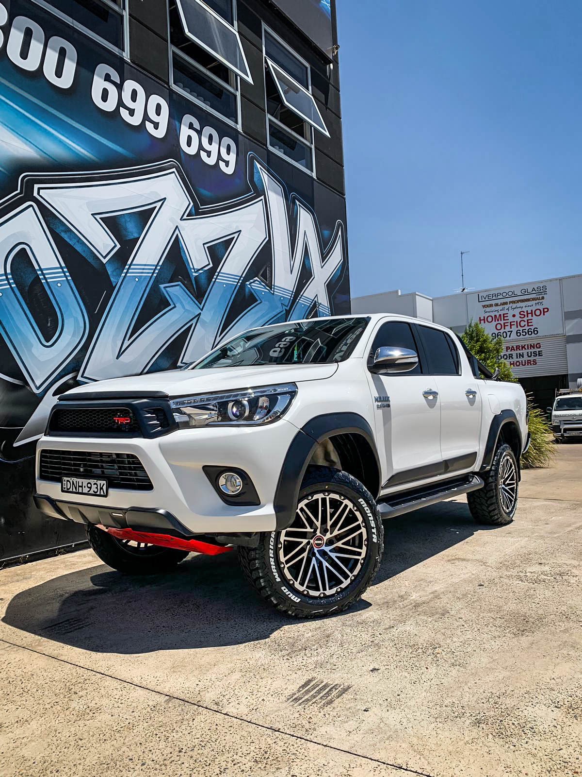 TOYOTA_HILUX_HUSSLA_SS1_GLOSS_BLACK_MACHINED_FACE_CHROME_BOLTS_20_MONSTA_MUD_WARRIOR1.jpg