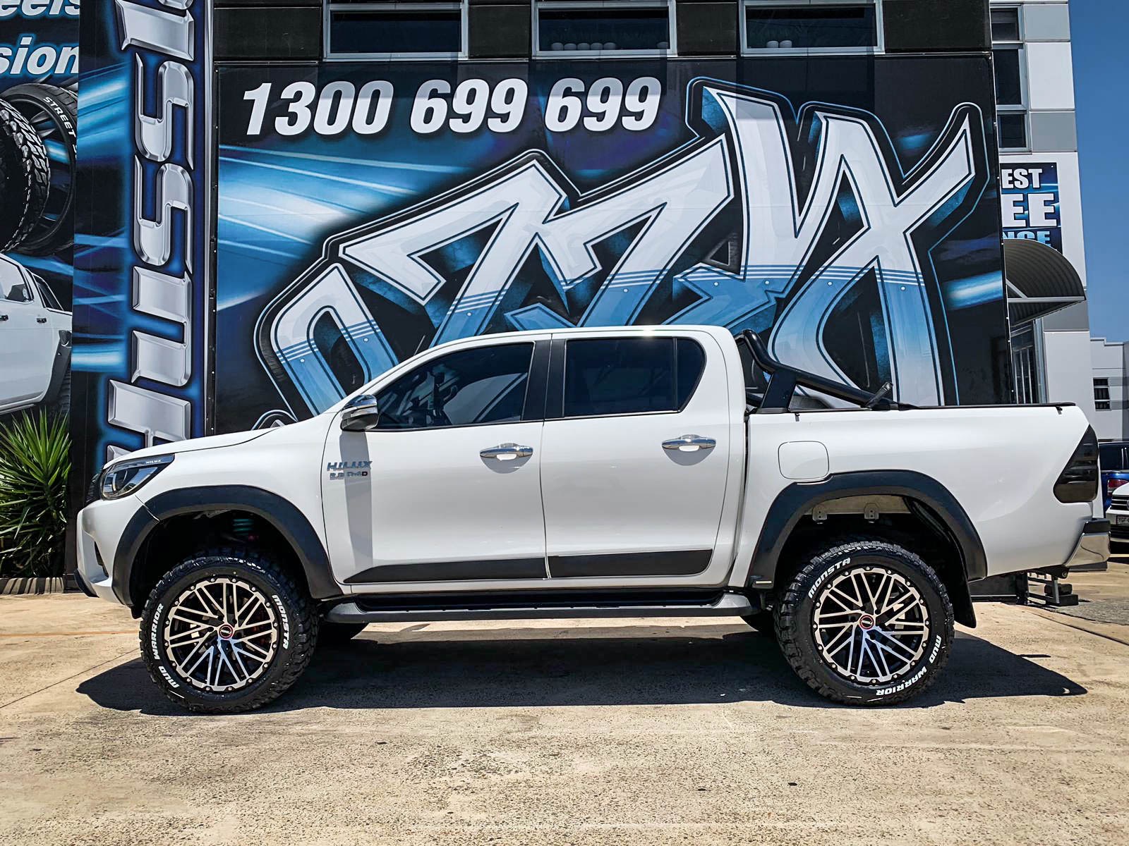 TOYOTA_HILUX_HUSSLA_SS1_GLOSS_BLACK_MACHINED_FACE_CHROME_BOLTS_20_MONSTA_MUD_WARRIOR3.jpg