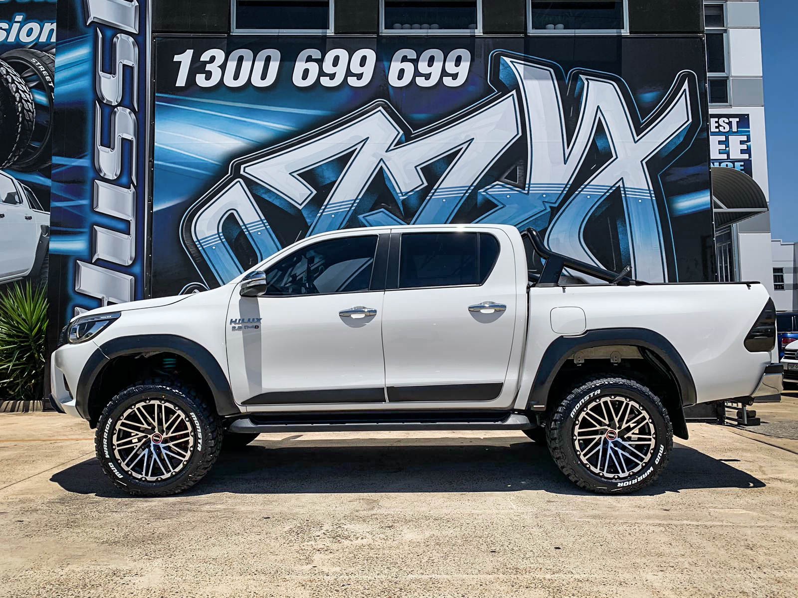 TOYOTA_HILUX_HUSSLA_SS1_GLOSS_BLACK_MACHINED_FACE_CHROME_BOLTS_20_MONSTA_MUD_WARRIOR6.jpg