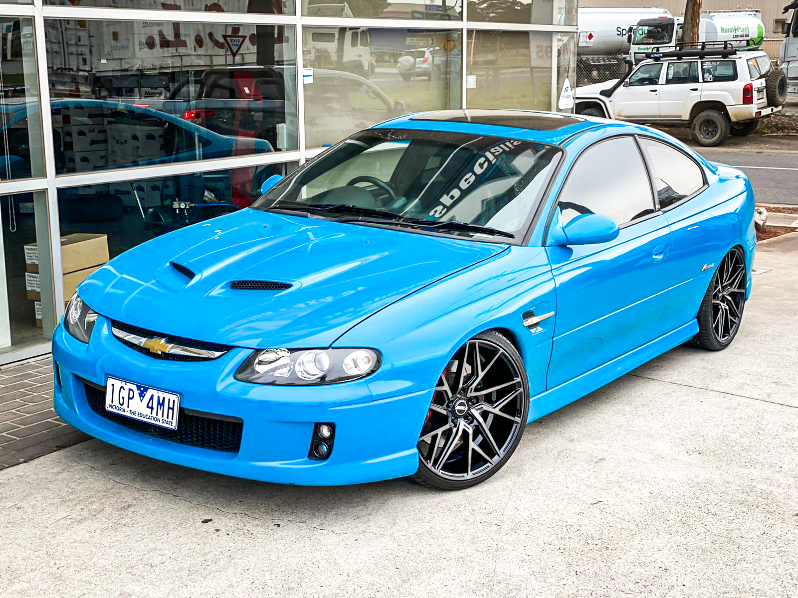 Holden commodore hussla jacques gloss black dark tint #4921